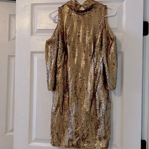 Gold sequin mini dress with open back cut out